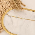 Goldenes Schlangenarmband mit bösem Blick auf Marmortablett mit Weizen dekoriert - Schlangenkette Türkisches Auge Stil (3#)