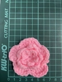 Detailed top view of a 7cm pink three-layer crochet flower on a green scale mat - 7cm / Pink