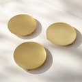 Three-piece set of matte gold round metal candle holders with decorative ball feet - 3-Piece Round Tray Set / Gold