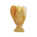 Standing yellow jade angel statue with folded wings and smooth finish on white background - Topaz