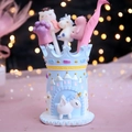 Blue unicorn castle pen holder with stationery on pink surface and star bokeh background - Blue Unicorn Castle (2021-4 Blue)