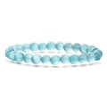 Détail des perles en pierre d'oeil de chat bleues sur bracelet élastique avec effet chatoyant - Œil de chat