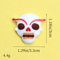 Detailed view of resin skull charm for DIY crafts with 3cm height and 3.3cm width specs - White Skull Red Heart Nose