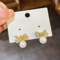 Elegant gold plated bow earrings with white pearls and sparkling cubic zirconia stones - Gold White Bow (10#)