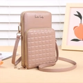 Pink faux leather crossbody phone bag with quilted diamond pattern and Smile Candy text - Apricot