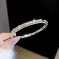 Macro shot of silver textured bangle featuring circular zircon stones and brushed finish - Silver-Brushed Texture (2#)