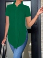 Detail view of the deep green short-sleeved polo shirt with stylish side slit hemline - S / Green