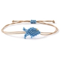 Handmade woven bracelet featuring a blue fish charm on light brown adjustable cord - Dark Blue