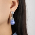 Elegante druppeloorbel met witte parel en blauwe kantagaat in zilveren afwerking - Zilver Blauw Hars