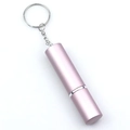 Close-up of pink metallic 5ml perfume atomizer with silver keychain on white background - Pink