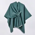 Detailed view of dark green knit shawl featuring diagonal strap design and woven texture - White Fringe with Stripe / Green