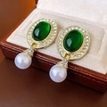 Detail of vintage flower earrings with green stones and pearl drops in a jewelry box - Gold Oval Style (20#)