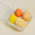 Set of four teardrop makeup sponges in orange and yellow shades with clear storage case - 4-Piece Set (Boxed) / Yellow Series