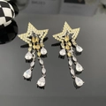Boucles d'oreilles étoiles argentées avec franges en cristal jaune et blanc - Boucles d'Oreilles Étoile à Franges Jaunes