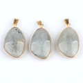 Irregular grey natural stone teardrop pendant with gold plated edges on white background - Labradorite (Single)