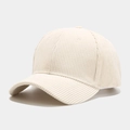 Detail of minimalist corduroy baseball cap in cream white with a side 45-degree angle view - White
