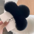 Close-up of a large black plush hair claw clip featuring soft faux rabbit fur texture - Black (Large)