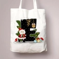 Detailweergave van de witte canvas shopper met kerstman en feestelijke letter E bedrukking - Letter E