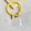 Bright yellow silicone phone wrist strap with silver spring clip and transparent insert - Yellow