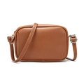 Detailed view of dark brown crossbody camera bag with Z-stitch adjustable strap and silver buckle - Brown