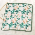 Detail of silk square scarf featuring elegant bamboo leaf prints on plush background - 70*70cm / Green Bamboo