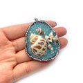 Sky blue natural stone shell pendant with sparkling crystal rhinestones border inlay - Sky Blue
