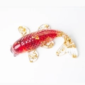 Red resin koi fish figurine with gold foil accents and transparent fins on white background - Red Glass