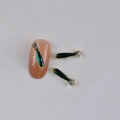 Golden nail charm with teardrop dark green gem and clear zircon on natural nail - Gold Base Dark Green Waterdrop Gemstone