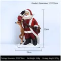 Christmas Santa and reindeer resin figurine on snow base, festive holiday decoration - Santa With Reindeer Figurine