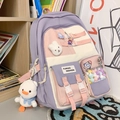 Cute purple and pink school backpack with cartoon charms and patches for students - Backpack with Charms and Badges / Purple