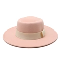 Detail of light pink wool felt boater hat featuring a beige grosgrain ribbon bow - M (56-58cm) / Pink with Beige Ribbon