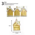 Set di 3 ciondoli natalizi a forma di casa dorata con dettagli in neve bianca e ganci - Oro Brillante (3 Pezzi/Scatola)