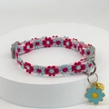 Detail of pink lace pet collar with colorful floral embroidery and gold bell on a white stand - Flower Pendant/Metal Bell / Rose Red Flower