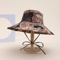 Black bucket hat with orange tropical palm leaf pattern and matching windproof strap - Leaf Style / Orange