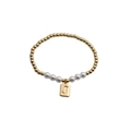 Detail of beaded bracelet with gold beads, white pearls, and embossed letter J pendant - Letter J