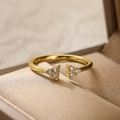 Macro shot of gold-plated adjustable ring with zircon-encrusted triangle tips - Adjustable Open / Gold with Triangle White Zirconia (13837)