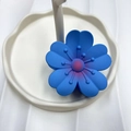 Blue plumeria flower hair claw clip on a white decorative tray for summer beach hair styling - Blue (Rubber Paint Lucky Flower)