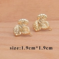 18k gold plated leaf-shaped jewelry findings with detailed veins and hanging loops - Golden Exquisite Leaf Style (M60010)