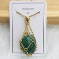 Handmade gold metal mesh net necklace featuring a green oval crystal stone pendant - Gold - Aventurine