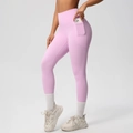 Detail of high-waisted yoga leggings with functional side pocket for mobile phone storage - S / Bottoms / Sakura Pink