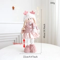 Pink Christmas plush girl doll with telescopic legs and size details for holiday decor - Pink Telescopic Girl