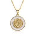 Macro detail of religious gold necklace with white enamel Virgin Mary pendant and chain - Style A010