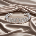 Sleek silver stainless steel open bangle with minimalist interlocking oval link design - f35 Linked Oval Style / Silver