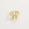 Macro shot of liquid metal style gold H-letter ring with polished finish and open design - Gold Ring N