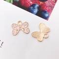 Pink enamel bow charm with gold polka dots for DIY jewelry making and earrings - Pink Polka Dot Bow (17x14mm)
