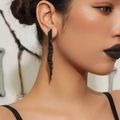 Luxurious long black tassel drop earrings with sparkling rhinestones on fashion model - Black Long Tassel Style (DTE1616795GU-BK)