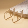 Eleganti orecchini geometrici dorati con strass in cristallo su una base in pietra - Oro