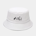 Close-up of white cotton canvas bucket hat featuring black star and moon embroidery detail - M (56-58cm) / White