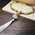 Zen Bodhi seed bracelet with green gradient beads and white lotus tassel charm - Hand-held Lime Green Bodhi (Luminous Lotus)