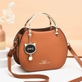 Brown PU leather shell handbag with golden ring handle and cute cat pendant charm - Khaki/Earth Yellow
